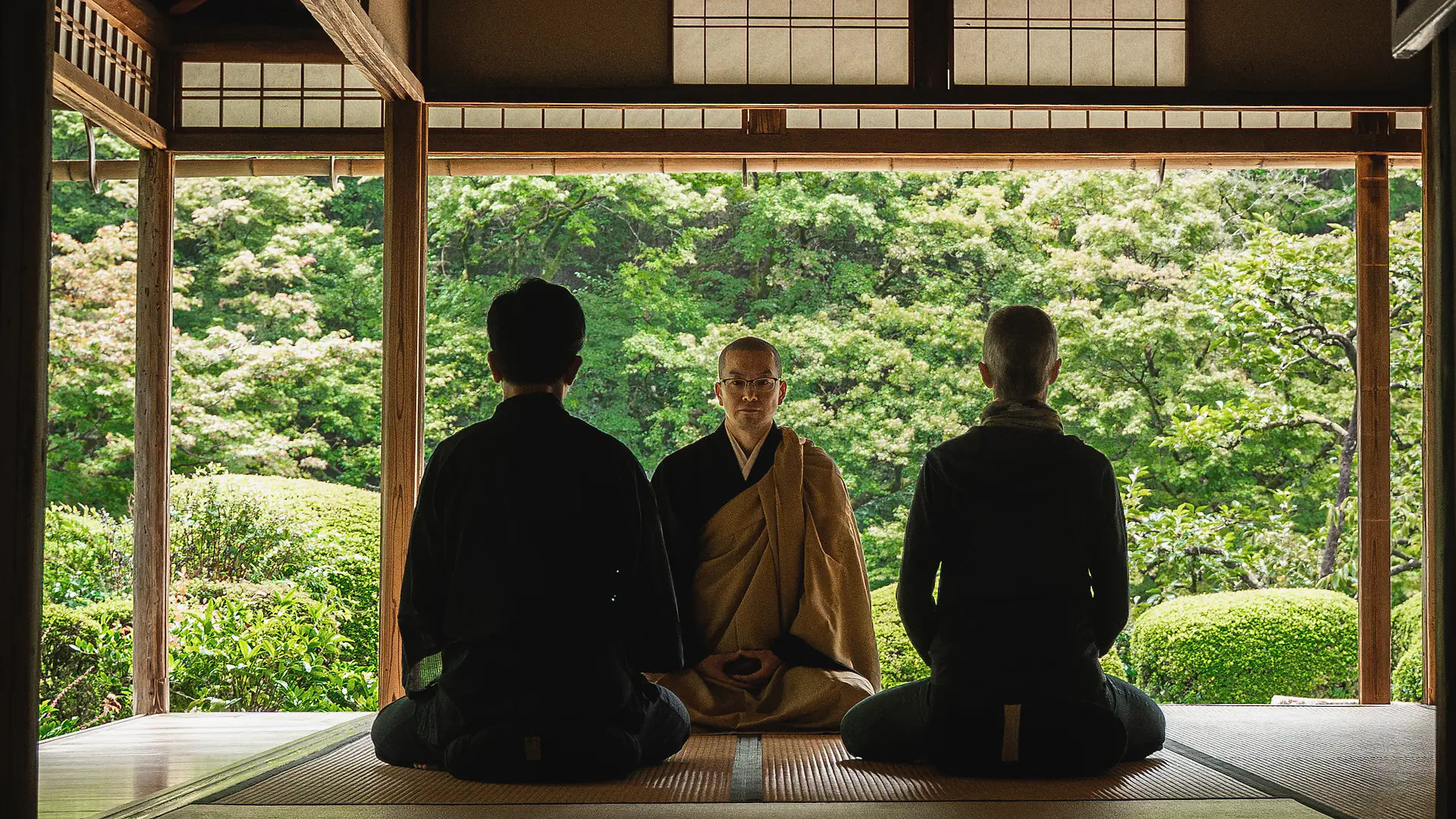 Zazen at Shisen-dō: two guests seated before a monk, the garden beyond